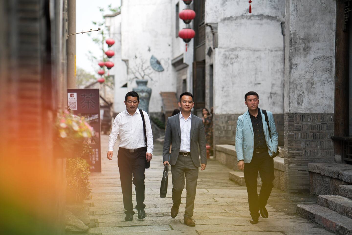 Changing life in Nanjing - Men walking